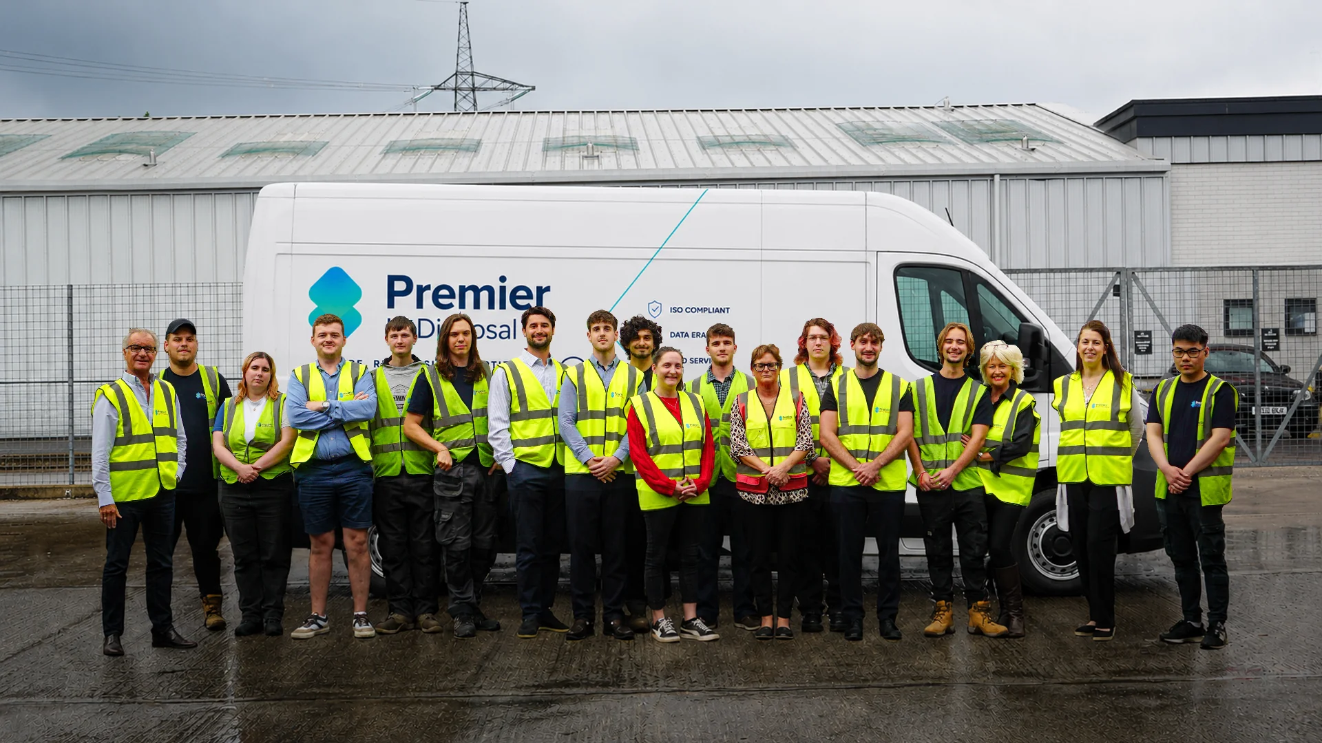 The Premier IT Disposal team in front of a branded collection van
